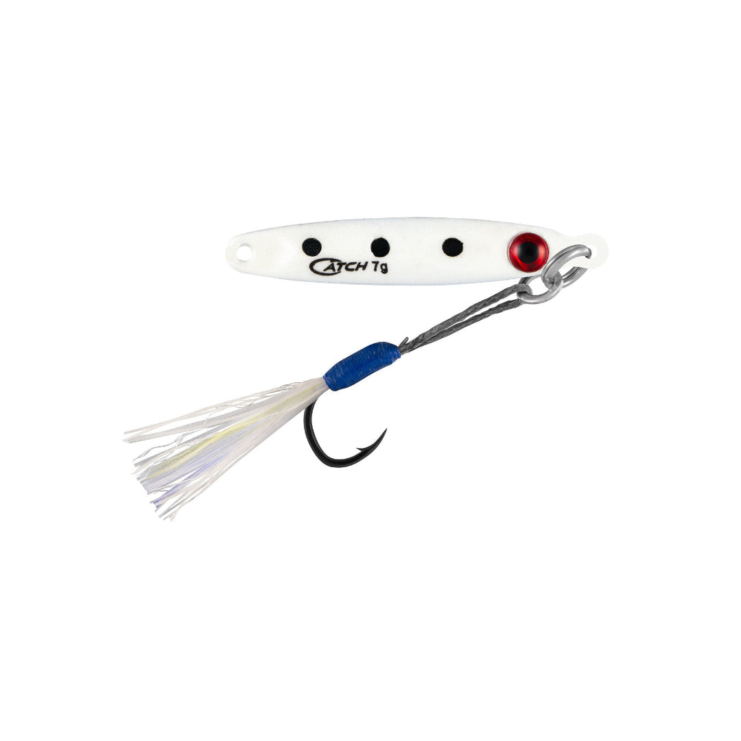 Fishing lure with a white body, red eye, and blue