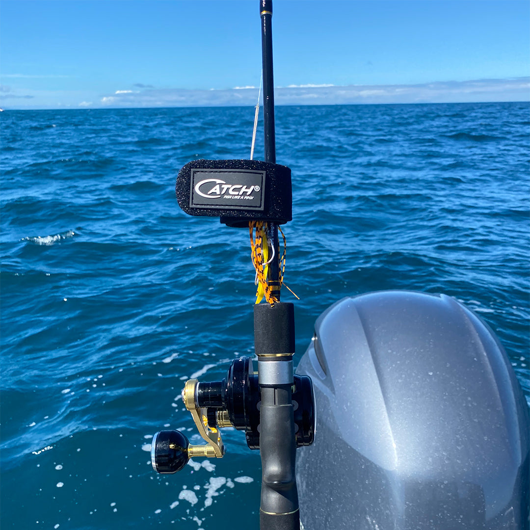 Catch Rod and Lure wrap in action fishing off Kawau Island New Zealand