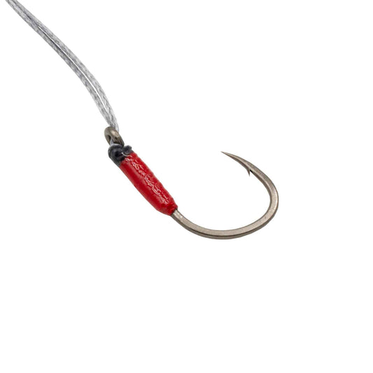 Fishing hook with red sleeve on a white background