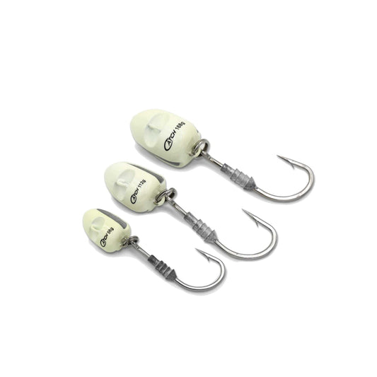 Three fishing lures with hooks on a white background