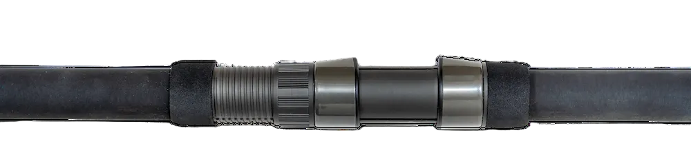 Close-up of a black and silver cylindrical object with a textured surface
