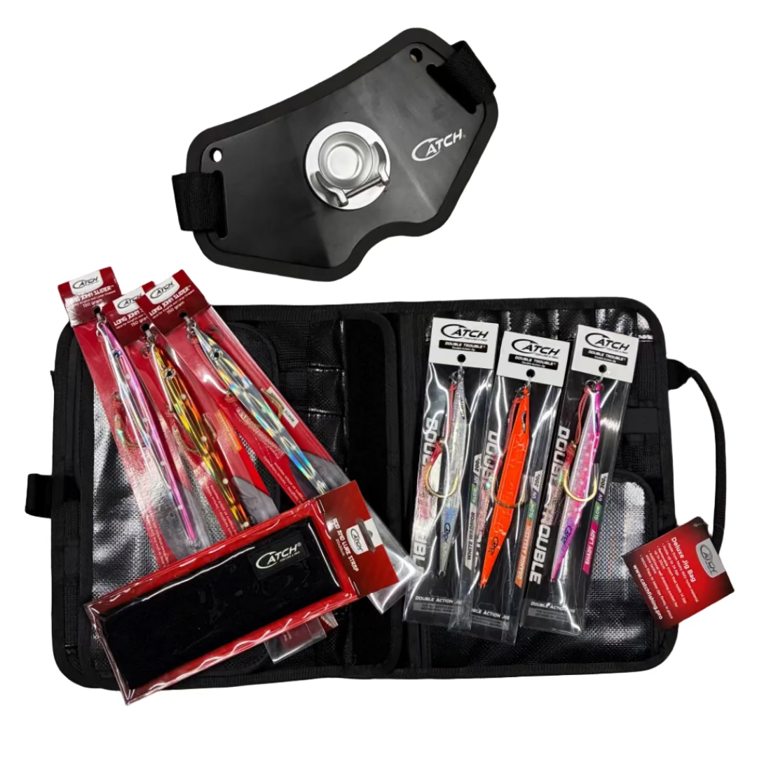 Catch fishing lure set with packaging on a concrete surface