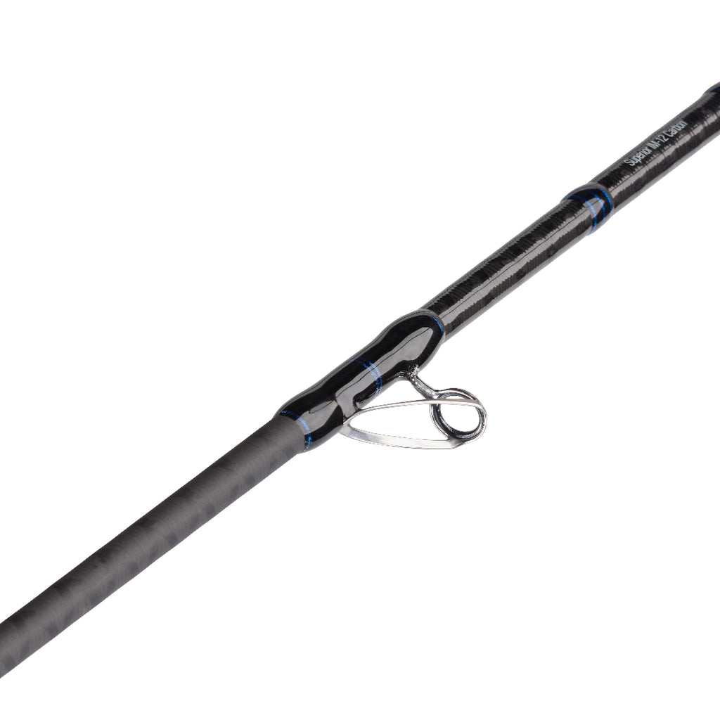 A close-up of a black carbon-fiber fishing rod blank with a silver metal guide and blue accent rings, shown diagonally on a plain white background.
