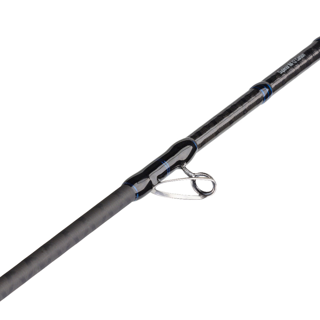 A close-up of a black carbon-fiber fishing rod blank with a silver metal guide and blue accent rings, shown diagonally on a plain white background.
