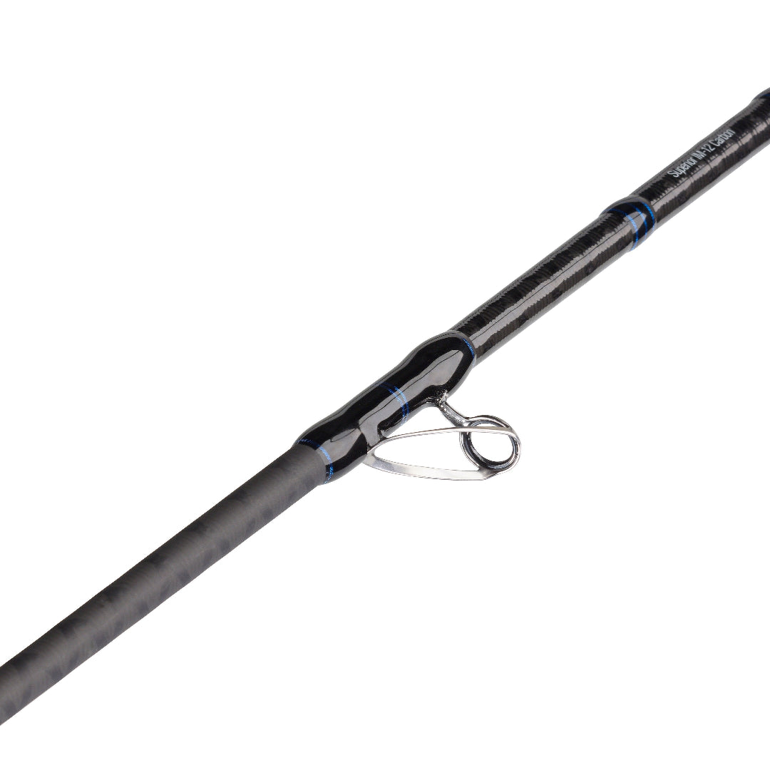 A close-up of a black carbon-fiber fishing rod blank with a silver metal guide and blue accent rings, shown diagonally on a plain white background.