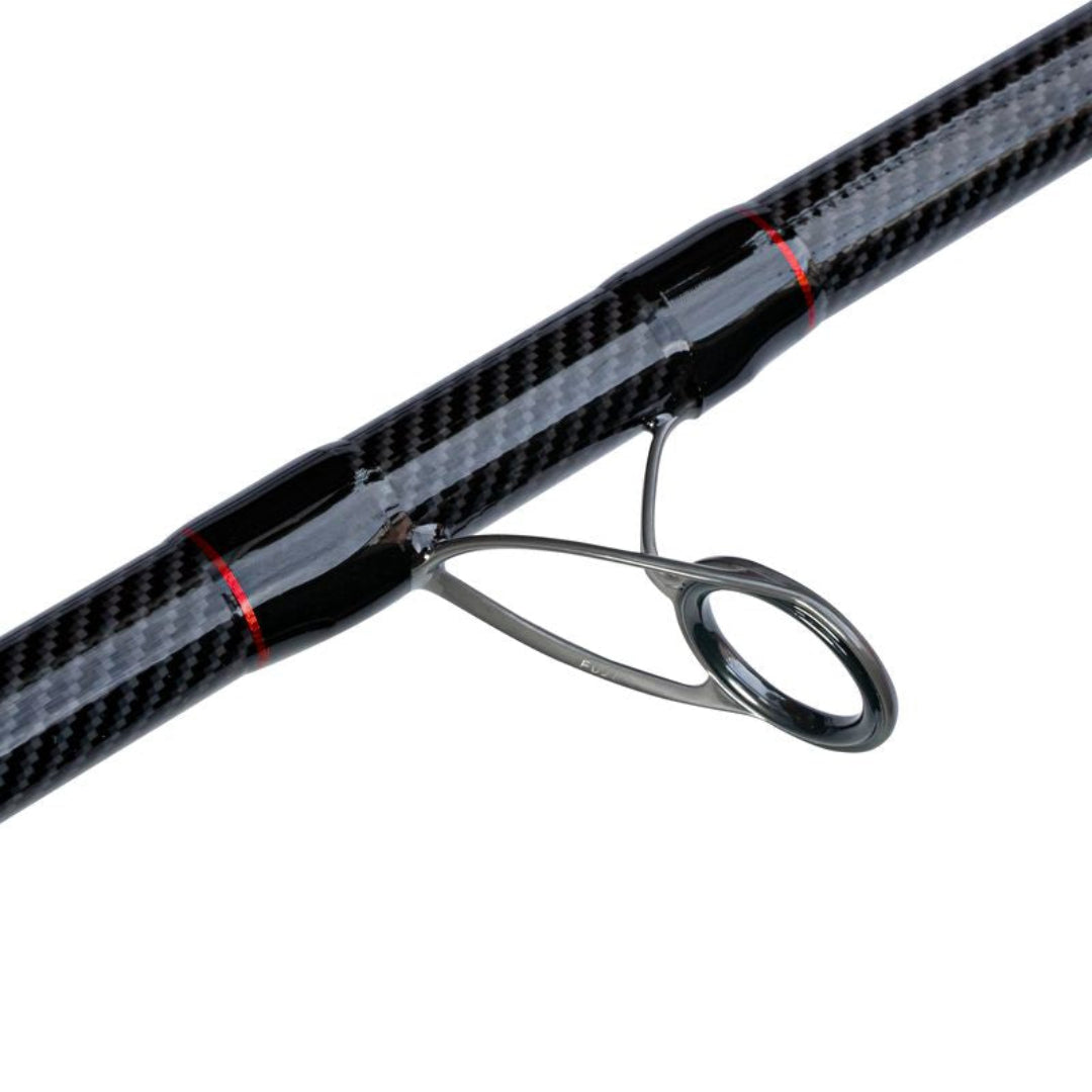 Fishing rod with black and gray carbon fiber handle on a white background