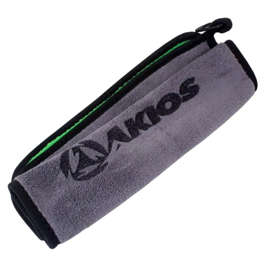A gray & green microfiber akios and inova branded cleaning cloth with black trim and a green accent line, featuring the Akios brand logo printed in black.