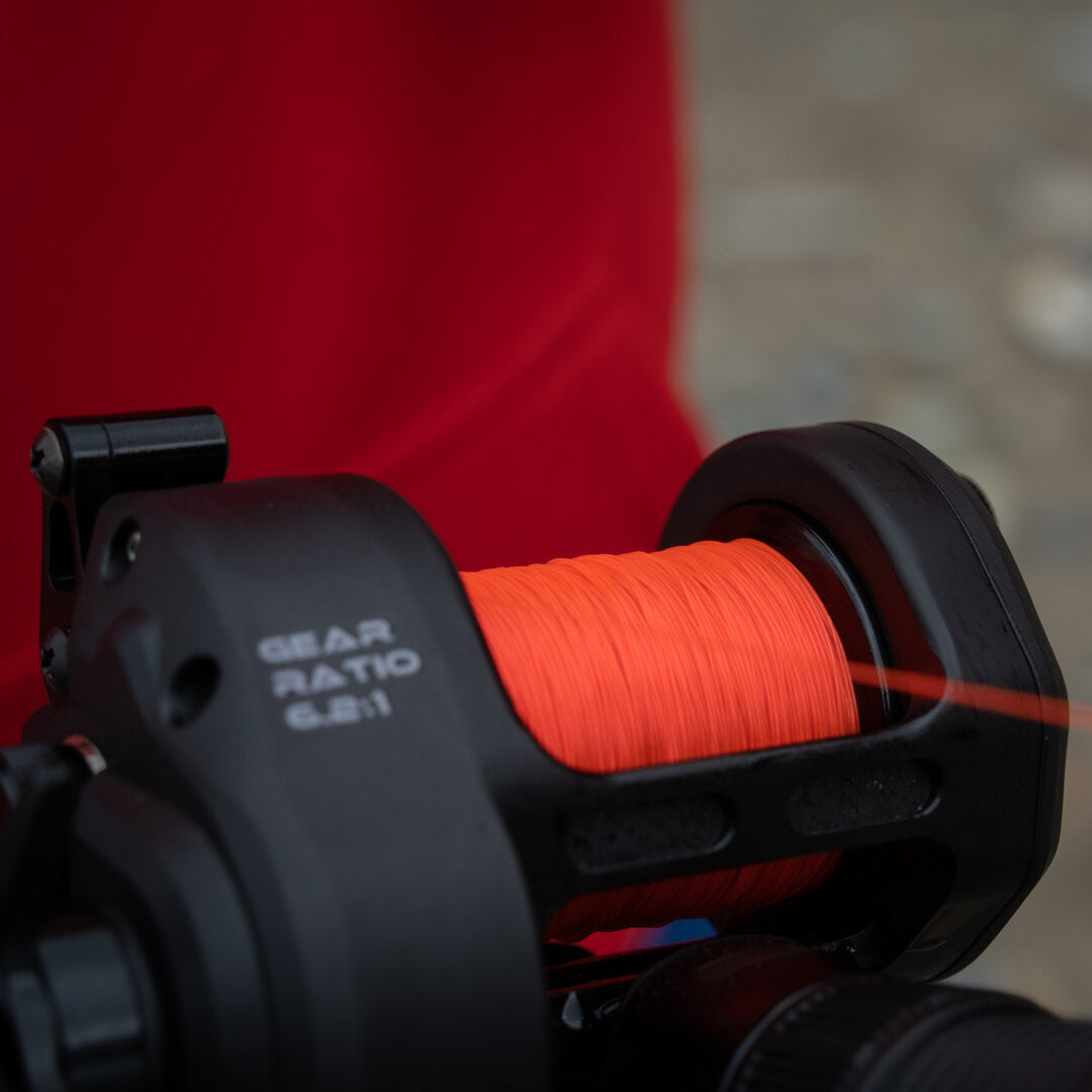 akios nitron f16 overhead surfcasting reel with red mono