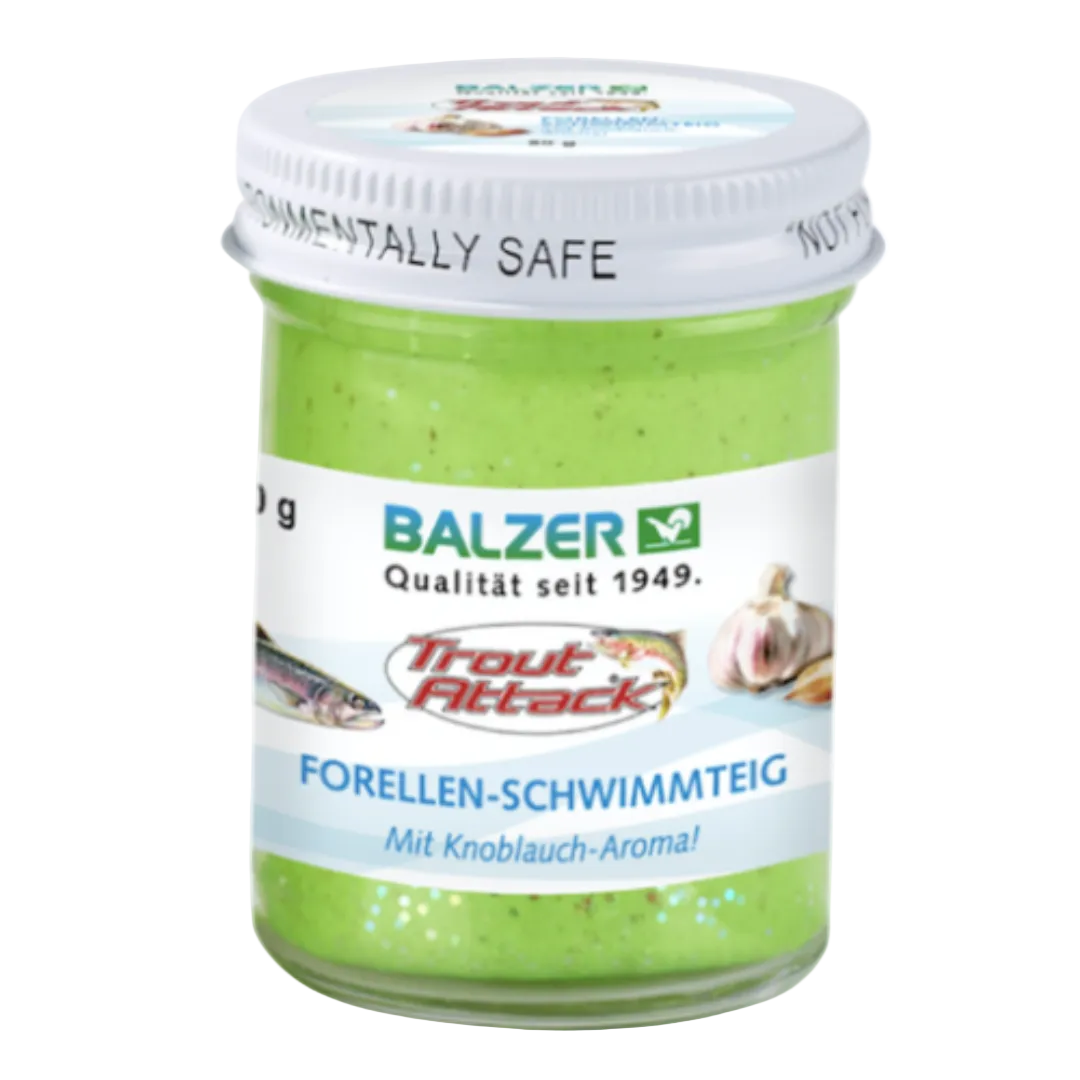 A jar of Balzer Trout Attack Forellen-Schwimmtig with Knoblauch-Aroma! containing bright green bait, sealed with a white screw cap and featuring a white label with blue and red text.