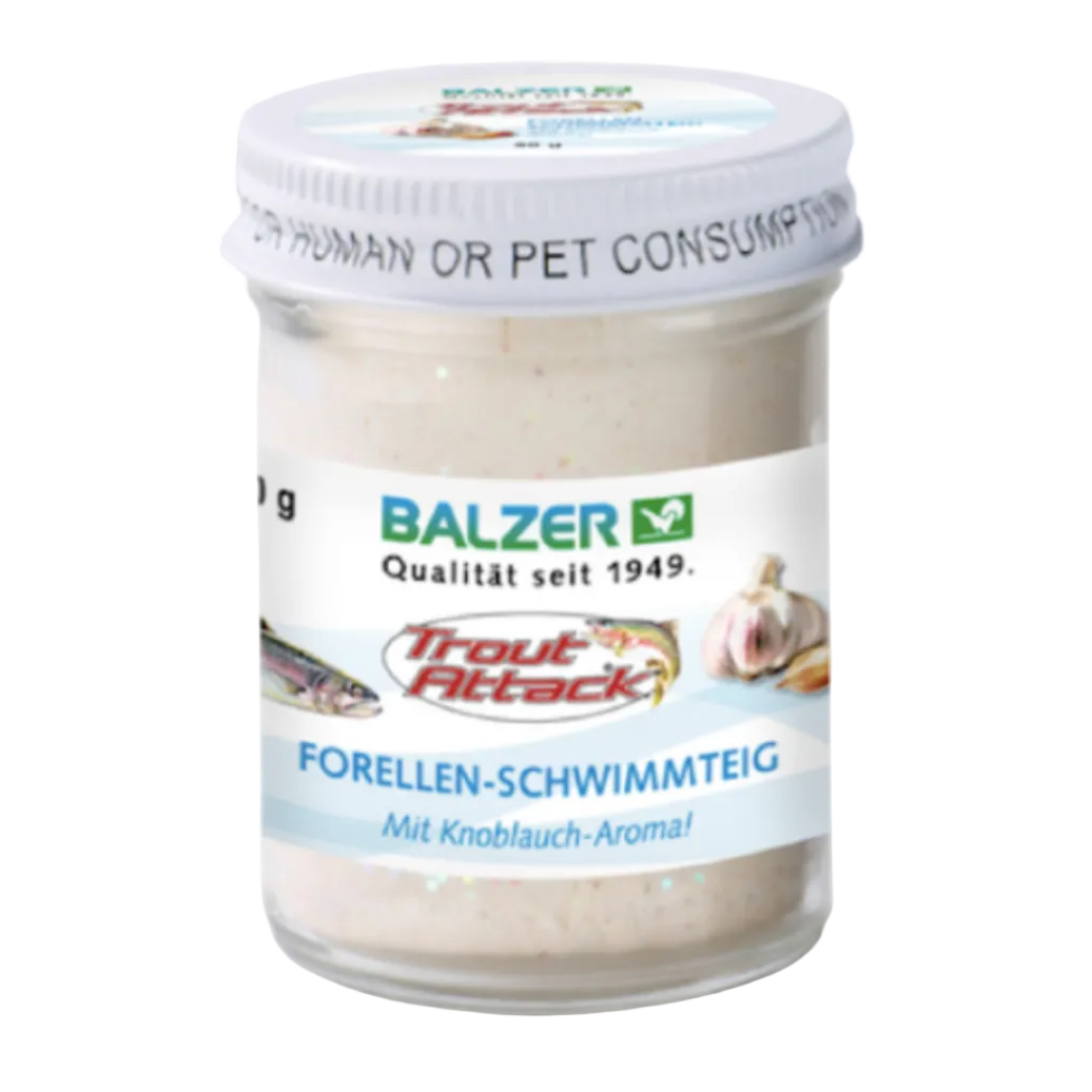 A jar of Balzer Trout Attack swim food for fish, featuring a white lid and a white label with blue and red text, set against a plain white background.