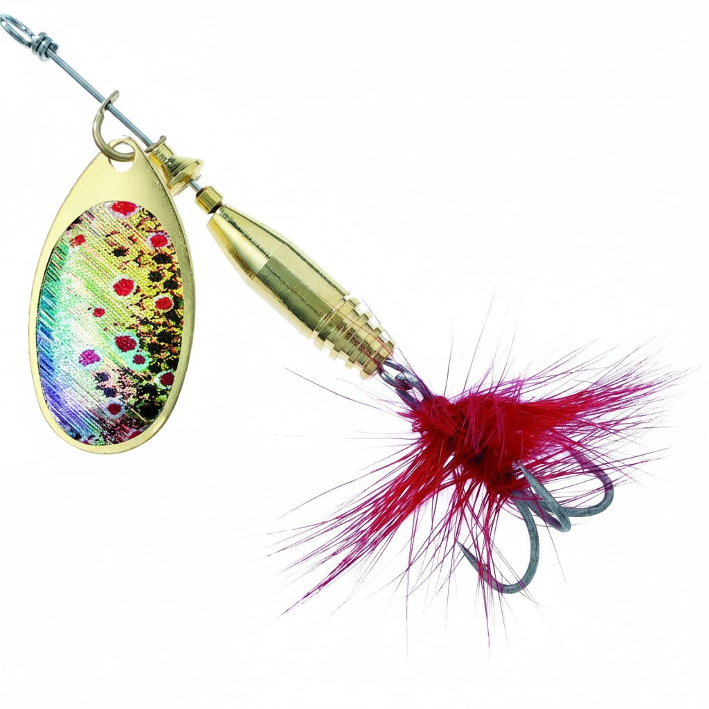 A gold-colored fishing lure with a teardrop-shaped blade featuring a vibrant, iridescent rainbow pattern with red and black spots, a gold bullet-shaped spinner, and a bright magenta-pink artificial hair skirt attached to a treble hook.