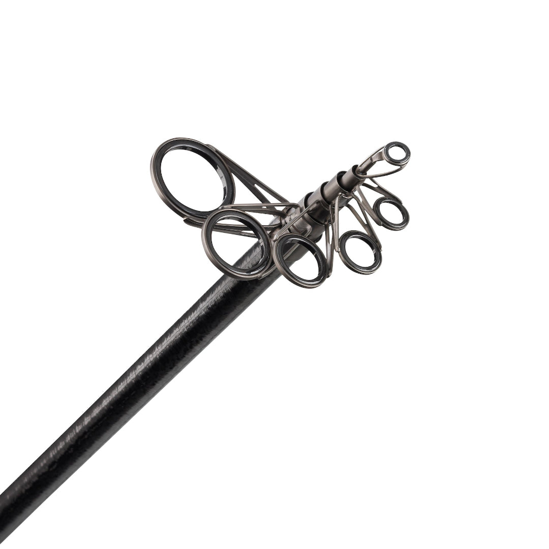 Decorative metal rod with intricate design on a white background