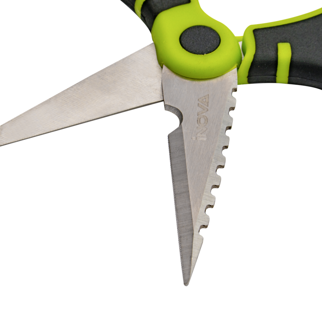 Close-up of pruning shears with silver metal blades, serrated back edge, lime green and black handles, and a visible VOGT logo on the blade.
