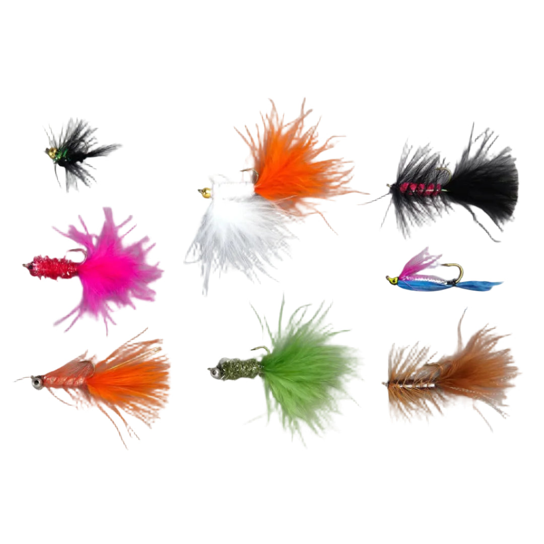 Collection of various colorful fishing lures on a gray background