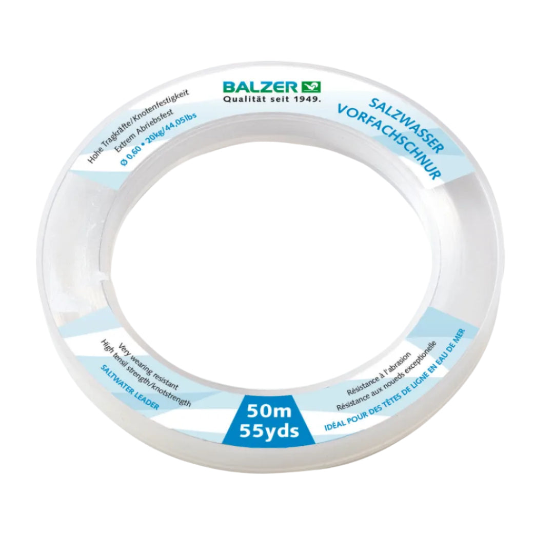 A spool of Balzer saltwater fishing line, featuring clear line wound on a white plastic core with blue and white printed labels. The label indicates a length of 50m (55 yards) and features the Balzer brand logo.